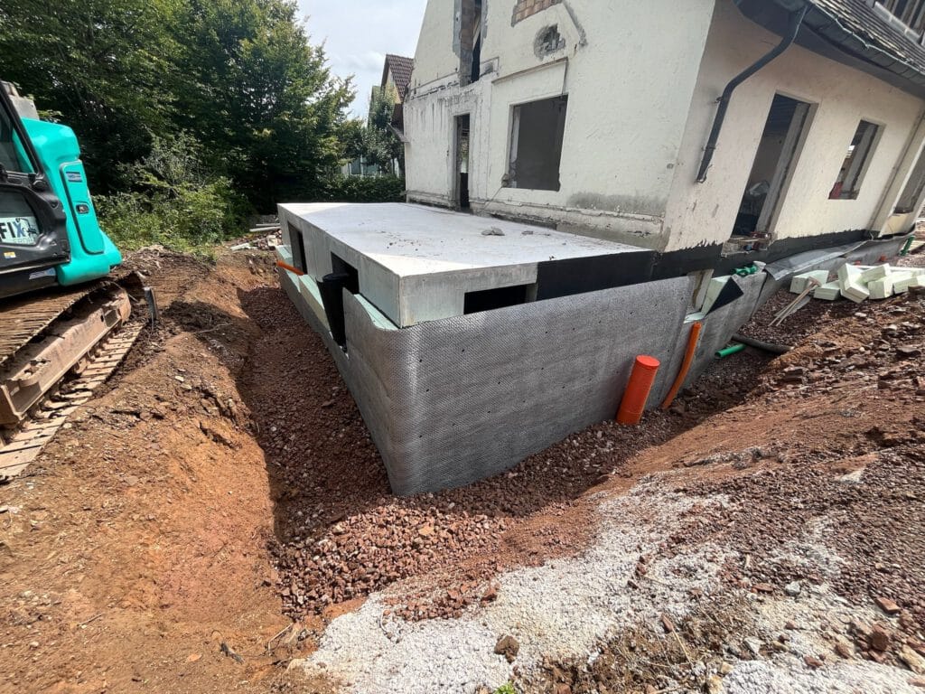 Teilabbruch und Neubau